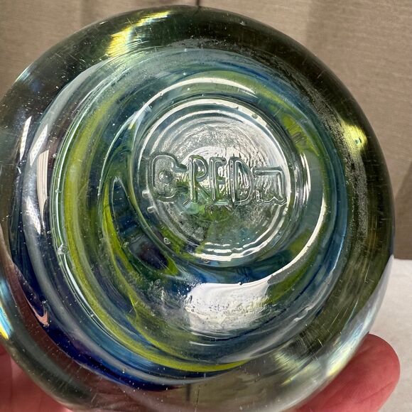 Clear glass round paperweight with blue and green swirls - Picture 6 of 7